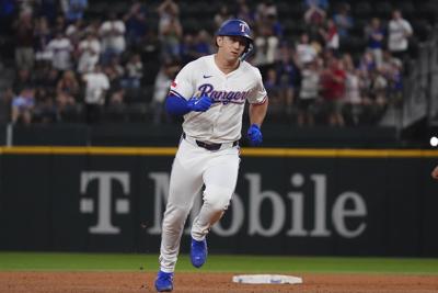 Langford homer ends no-hit bid and gives Rangers 2-1 win over Colorado after Rockies fired manager