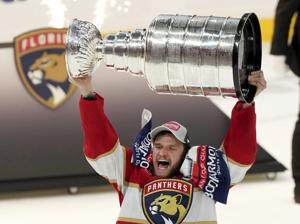 Surprise! NHL, with the help of kids, gives Barkov the Selke and King Clancy awards
