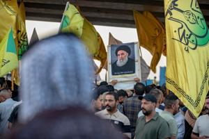 As the last US troops exit Iraq, Kurdish fears rise and militias celebrate