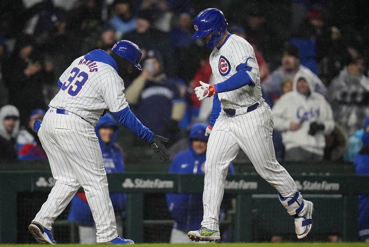 Suzuki homers, drives in 4 to help Cubs beat Rockies 9-8 after