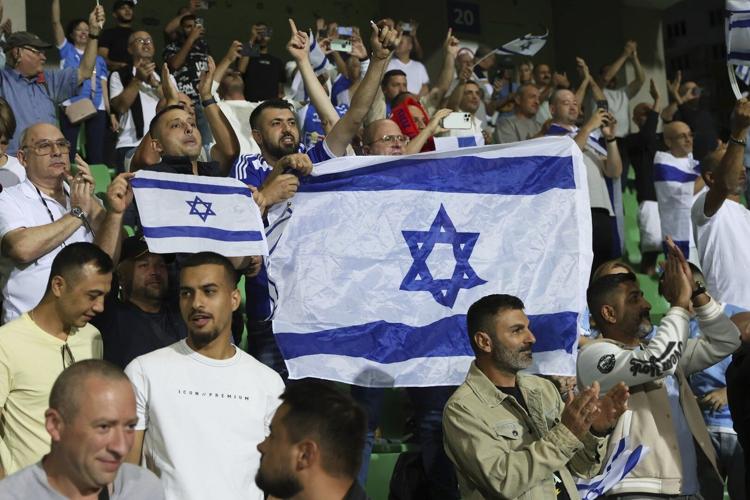 Israel soccer coach 'standing behind my country' amid calls for squad to be suspended
