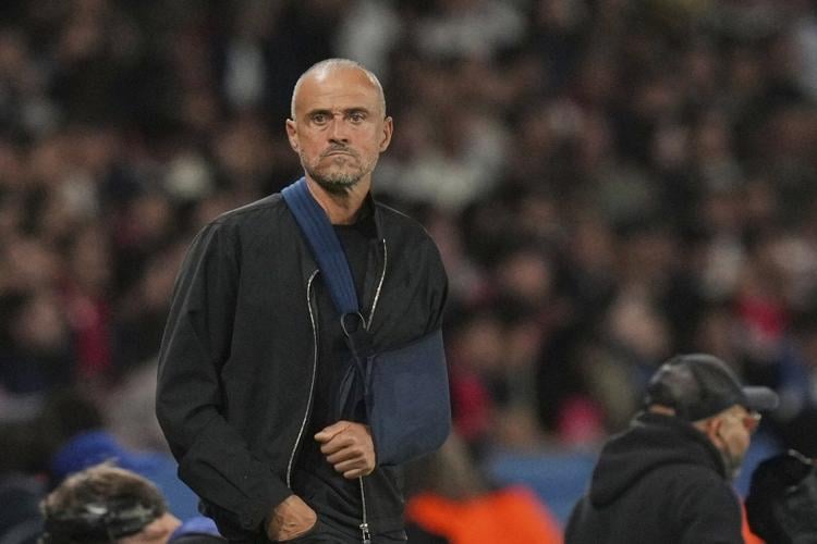 PSG coach Luis Enrique has a high view of his players from up in the stands
