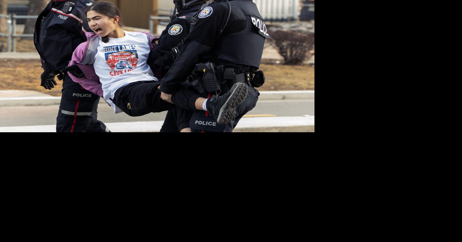 Two fined after protest over Toronto bike lanes removal