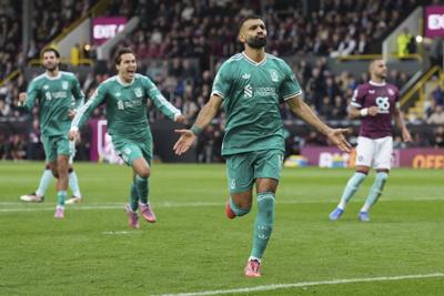 Mohamed Salah scores late penalty to preserve Liverpool's 100% start