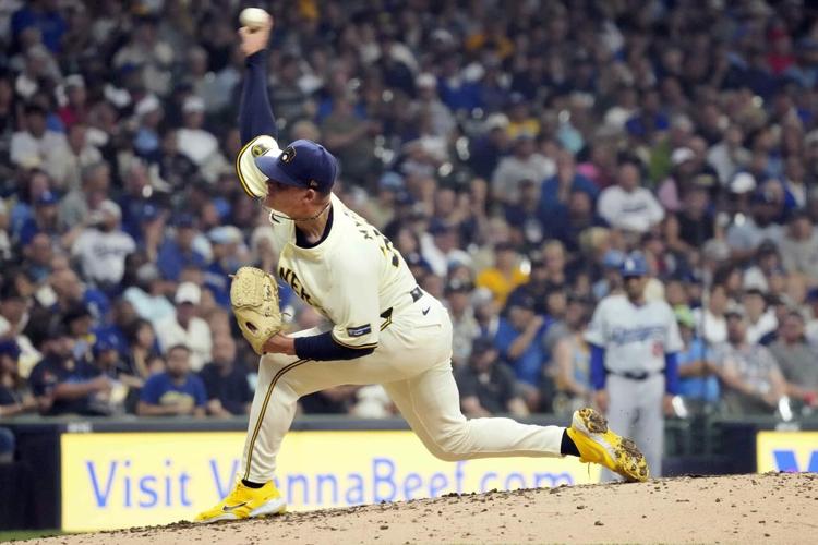 Brewers rally in 8th to beat Dodgers 6-4 and earn a series split in matchup of division leaders