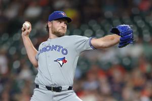 Trey Yesavage leaves Jays' road loss to Astros with left knee discomfort