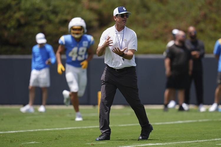 Chargers back in San Diego for 2 days at school where Harbaugh landed 1st head coaching job
