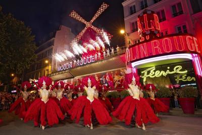 Moulin Rouge's red windmill sails restored and turning again