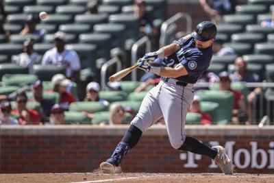 Raliegh hits major league-leading 53rd homer, Mariners rout Braves 18-2 with most runs since 2012