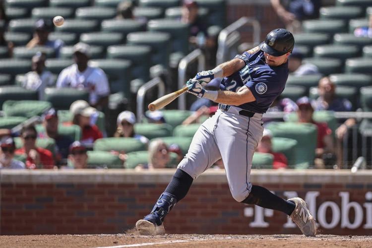 Raliegh hits major league-leading 53rd homer, Mariners rout Braves 18-2 with most runs since 2012