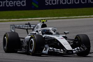 Valtteri Bottas cycles from Sepang to Singapore ahead of the next F1 race