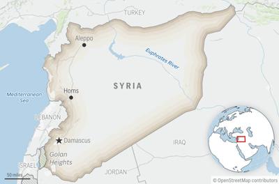 Remains of 30 people believed killed by IS militants found in Syria in a search by Qatar and FBI