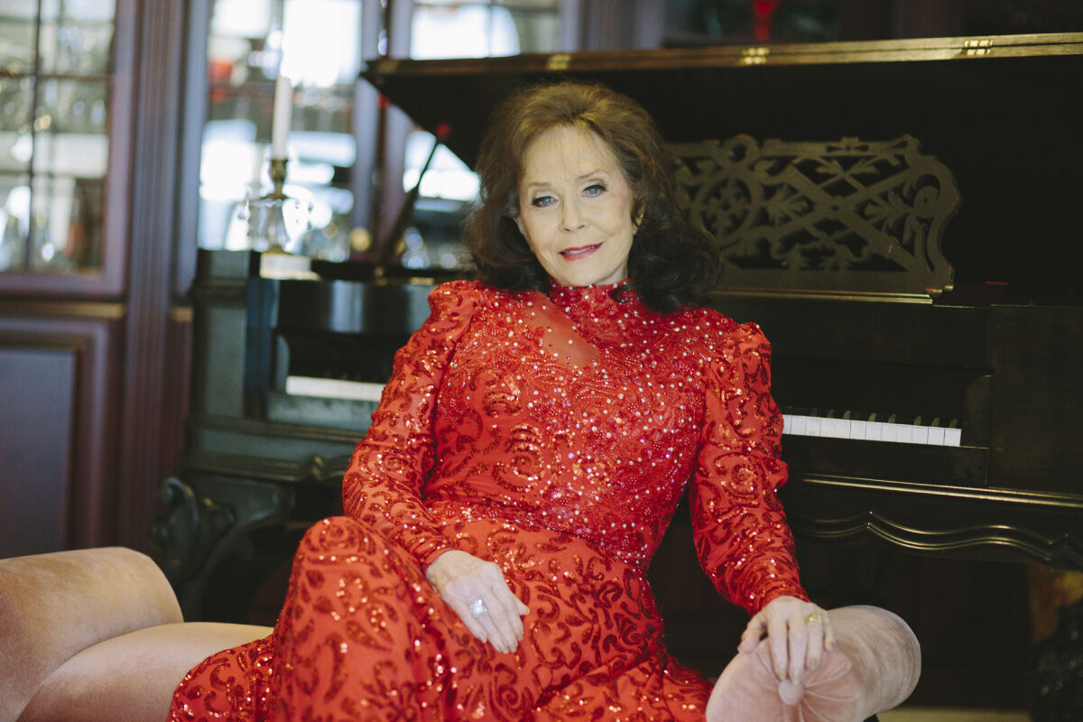 loretta lynn red dress Loretta Lynn Prepping New Music Following Health Complications
