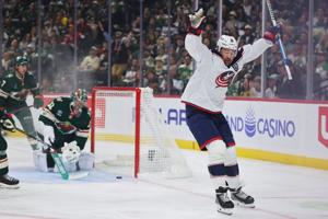 Marchenko's hat trick and Merzlikins' 48 saves help Blue Jackets spoil Wild home opener with 7-4 win
