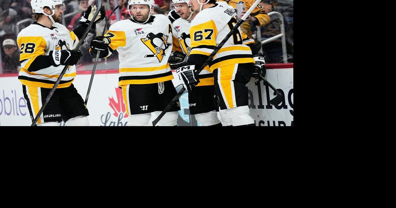 Bryan Rust and Yegor Chinakhov send the streaking Penguins past the Red Wings, 4-1