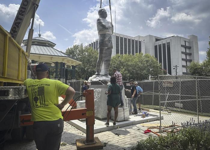 Bronze statue of John Lewis replaces more than 100-year-old Confederate monument