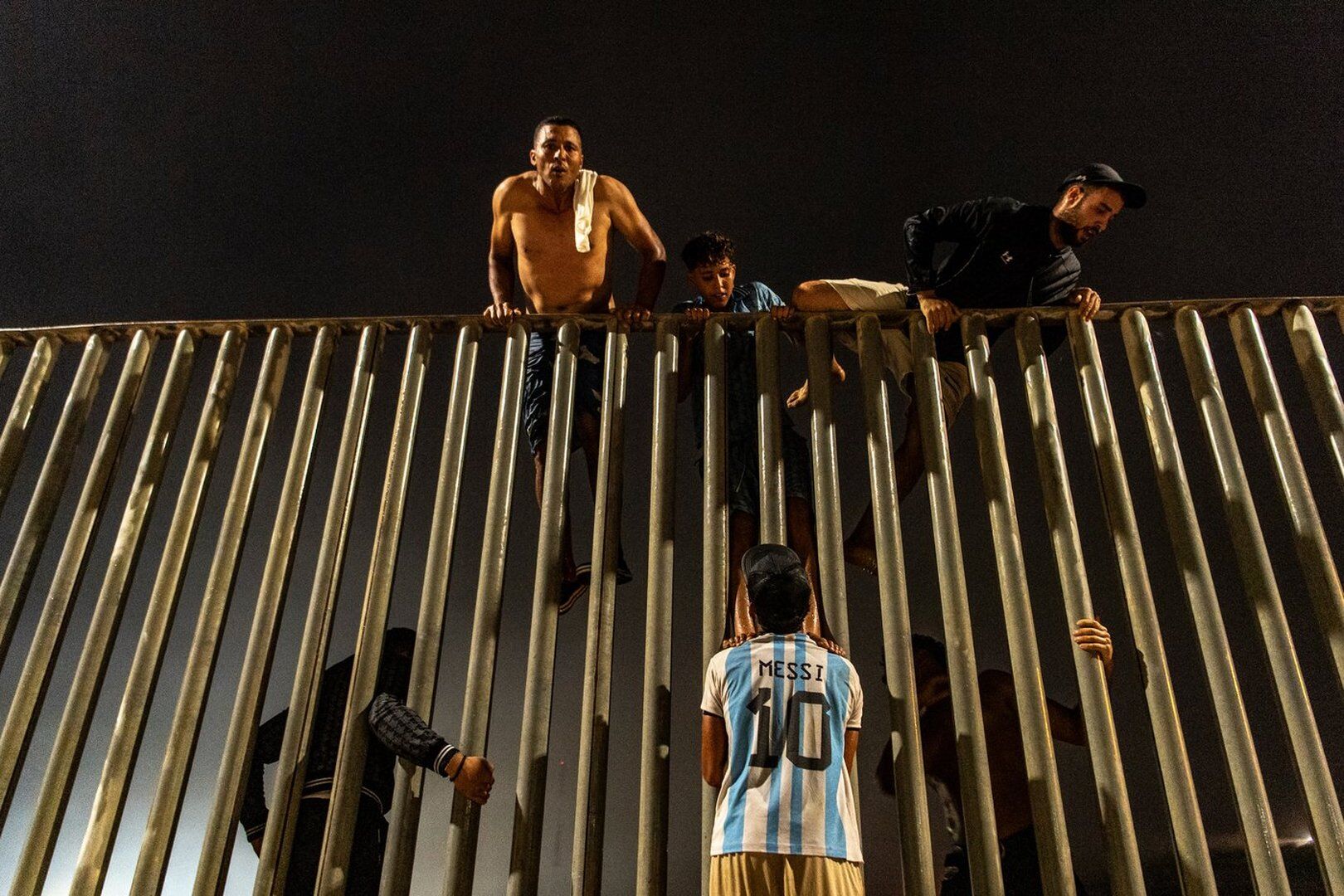 At least 18 die in the border breach; thousands of migrants enter Spanish enclave of Ceuta from Morocco