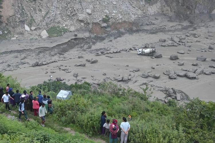 Rescuers search for 19 missing and recover 9 bodies after flooding in Nepal