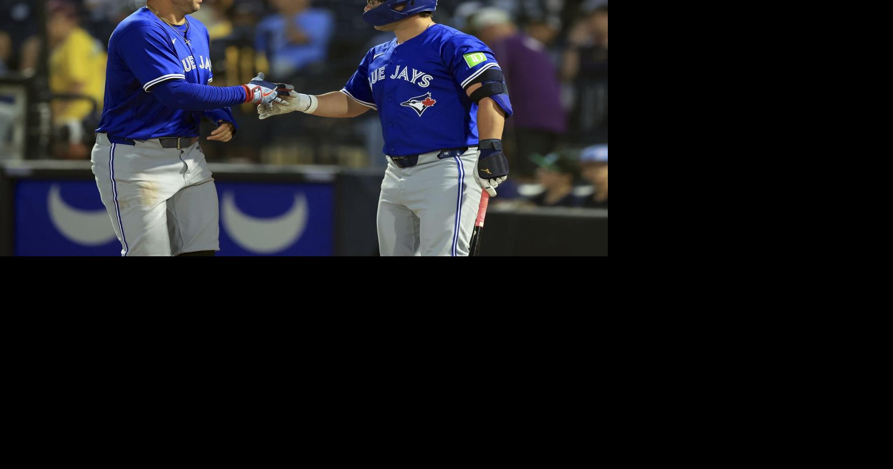 Blue Jays win despite a controversial fan interference call