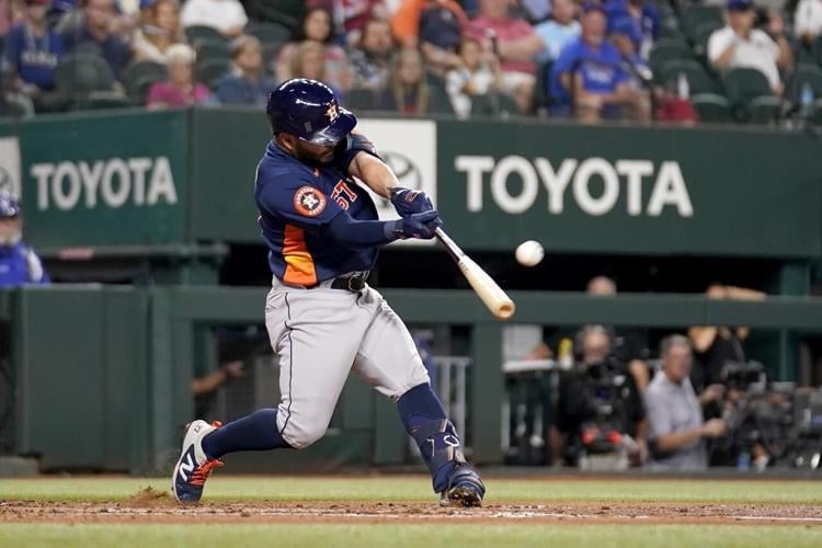 Altuve's 3 homers lift Astros past Red Sox