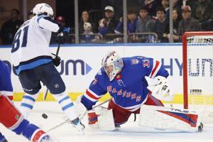 Jets beat the Rangers in a shootout to spoil goalie Dylan Garand's NHL debut