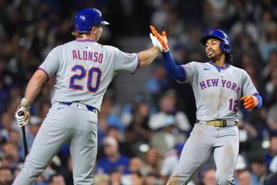 Lindor homers to join 30-30 club as Mets beat Cubs 8-5 to remain in playoff position