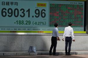 Asian shares slip as worries about rising oil prices offset boost from strong earnings