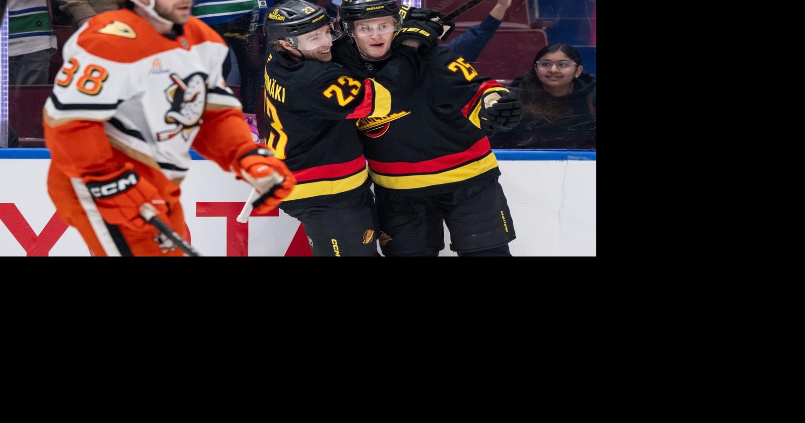 Canucks score five first-period goals en route to 6-2 victory over Ducks