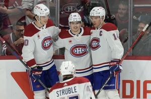 Habs captain Suzuki wins Selke Trophy, teammate Caufield takes Lady Byng