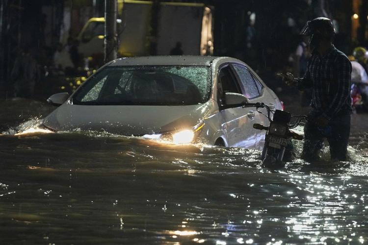 Over 120,000 evacuated from central Pakistan as floods leave survivors in scorching heat