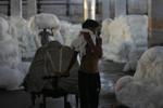 Climate-driven heat in India’s textile factories stifles workers but coolers and ventilation help