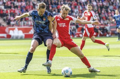Bundesliga club Heidenheim accuses Berlin police of 'extreme violence' against its fans