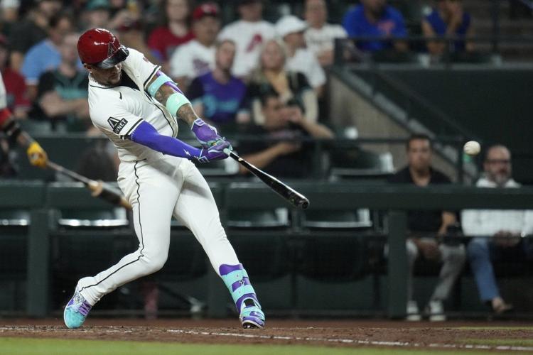 Marte hits 3-run homer in 7th and Diamondbacks stop Rangers' 6-game win streak with 5-3 victory