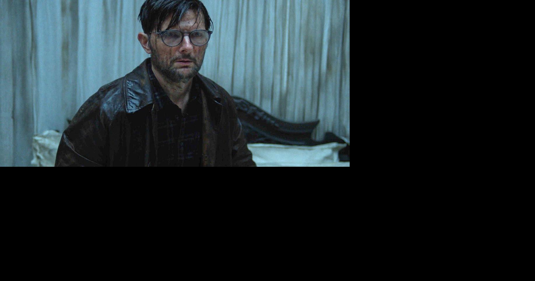 Movie Review: Adam Scott gets spooked in a haunted hotel in ‘Hokum’