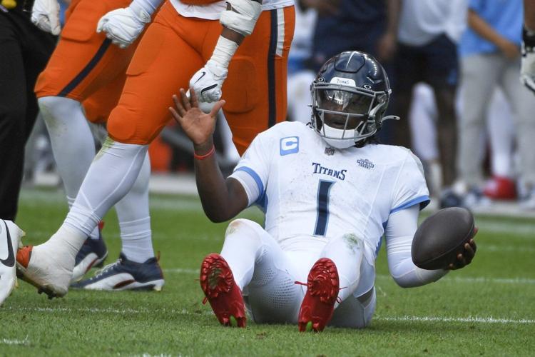 Denver's defense swarms top overall draft pick as Titans' Cam Ward loses NFL debut