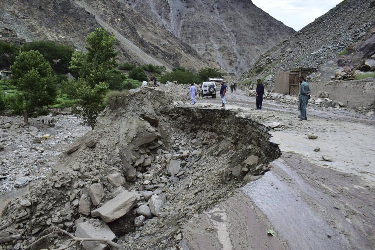 Rescuers expand search in northern Pakistan for 12 missing tourists swept away by floods