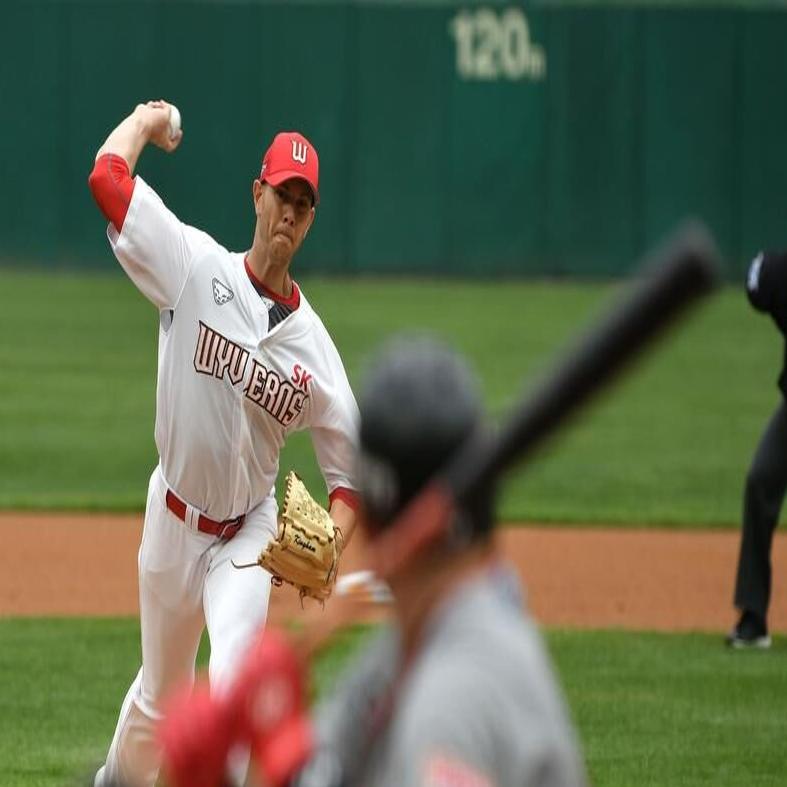 Empty stands, masked players as baseball returns