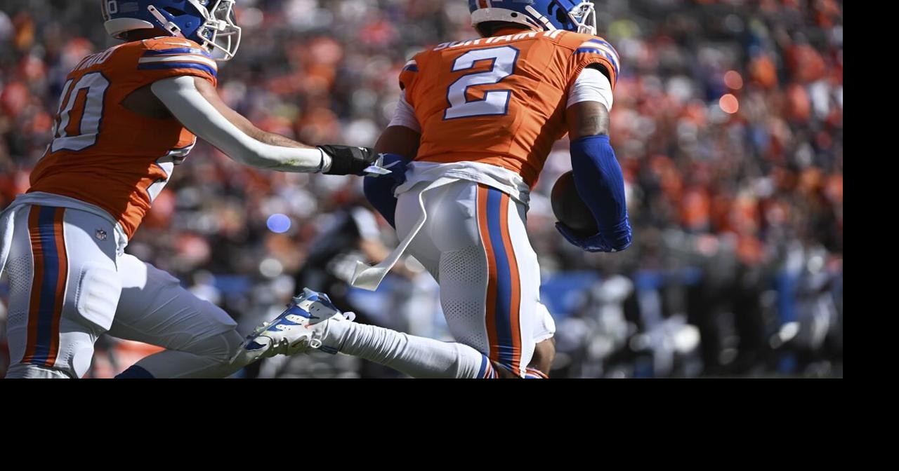 Surtain's two interceptions power Broncos past Raiders 34-18, snapping 8-game skid against Las Vegas