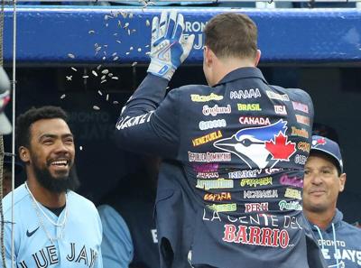 Matt Chapman of the Toronto Blue Jays gets the home run jacket