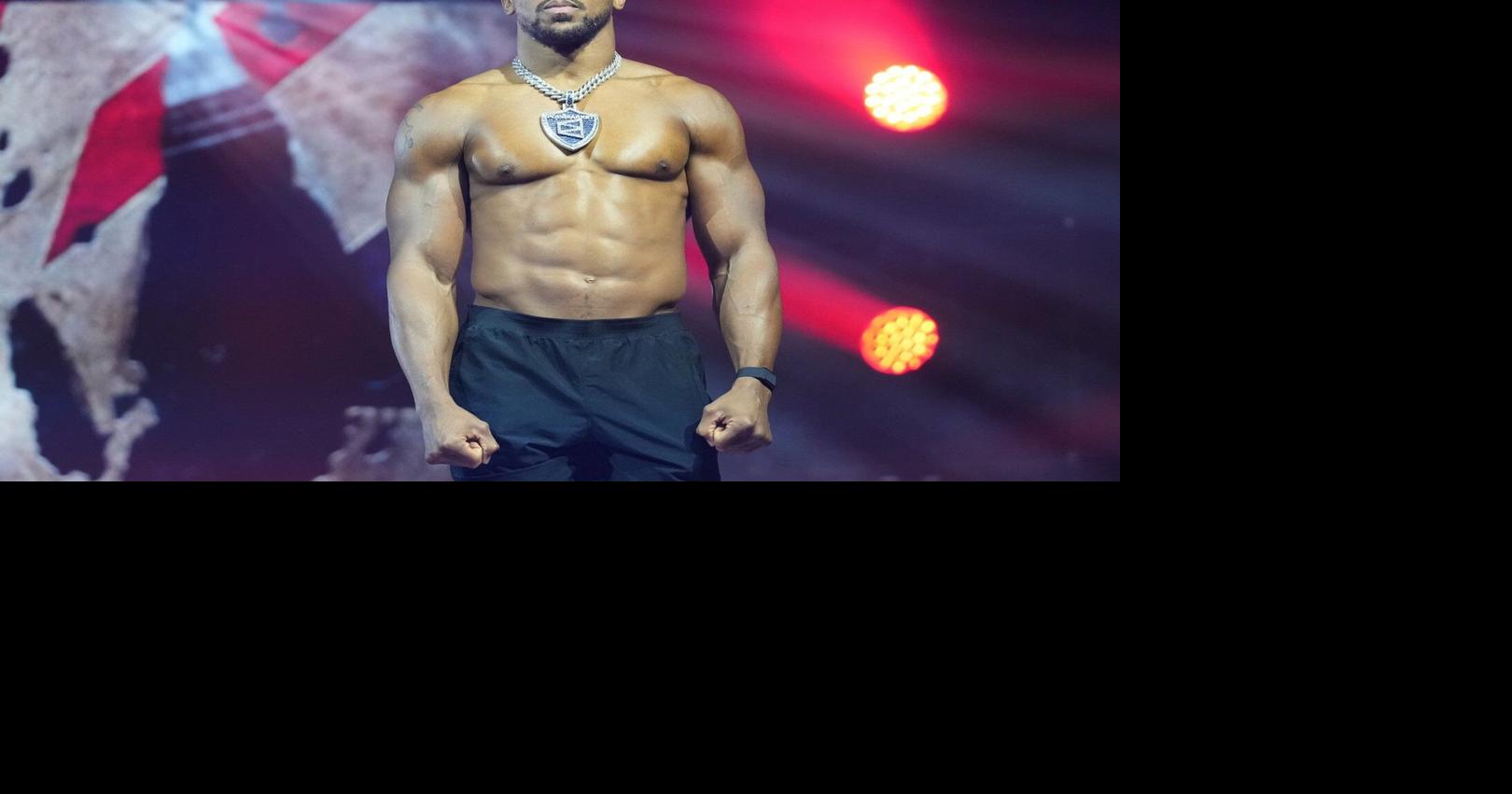 Anthony Joshua returns to Britain after car crash that killed two friends in Nigeria