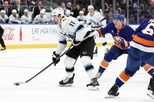 NHL scores: Dylan Guenther has 1st career hat trick to send Mammoth to 7-2 victory over Isles