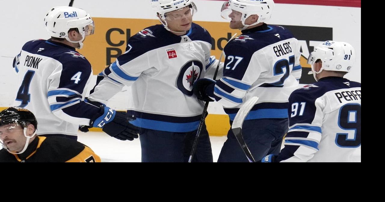 Connor and Hellebuyck shine as Jets defeat Penguins 4-1