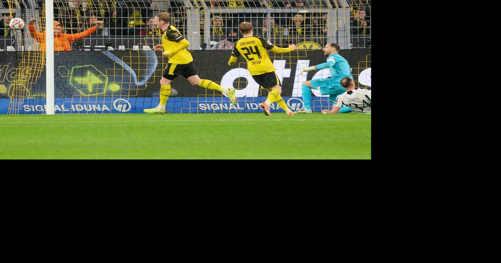 Dortmund beats Hoffenheim 2-0 to cement third spot in Bundesliga