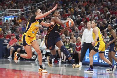 Azura Stevens' double-double lifts Sparks over Fever