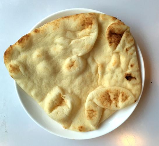 Greek pita or Indian naan breads? Which one is the healthier choice?