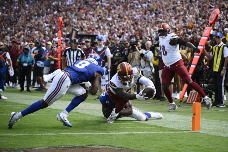 Samuel scores in Washington debut, and the Commanders stifle the Giants in a 21-6 win