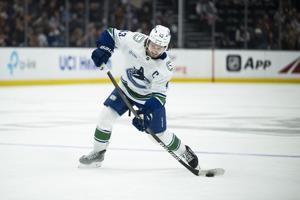 Vancouver Canucks captain Quinn Hughes remains 'day to day' with injury: coach