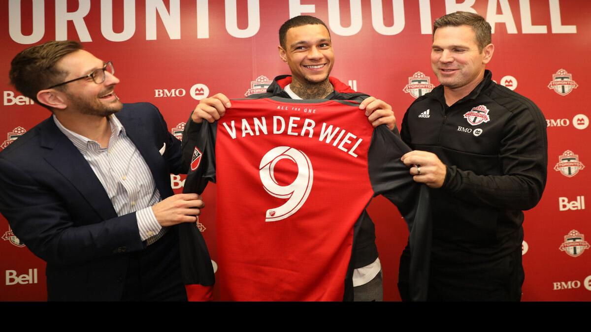 Reds go Dutch with high hopes for van der Wiel