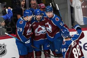 Kadri scores twice to help Avalanche scorch the Flames 9-2