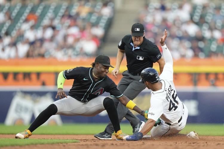 Tigers hit 3 homers in a six-run fifth inning and rout the Diamondbacks 12-2